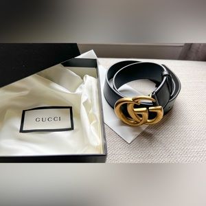 Gucci Leather belt with double G buckle. Preowned in excellent condition.